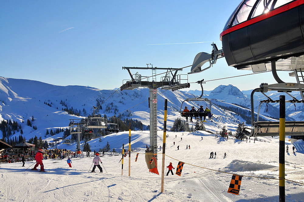 Ski slope at ski area Ehrenbachhoehe in the sunlight, Winter in Tyrol, Austria, Europe