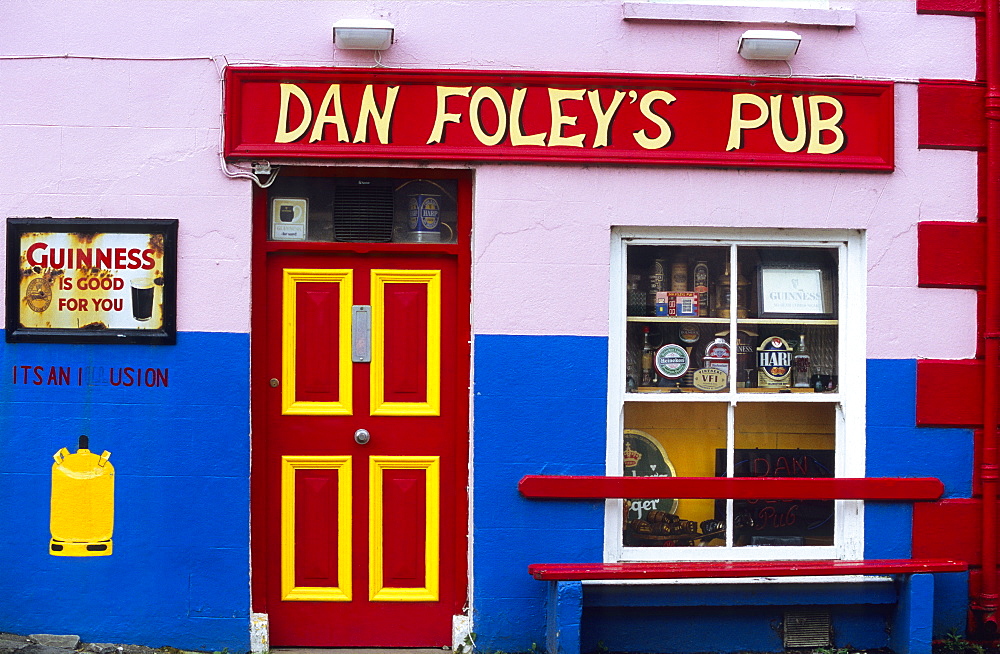 View at the colourful facade of Dan Foley's Pub, Anascaul, County Kerry, Ireland, Europe