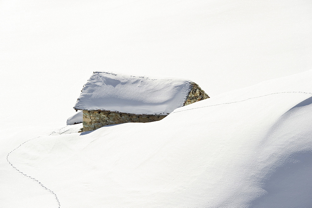 Snowy mountain hut, Tignes, Val d Isere, Savoie department, Rhone-Alpes, France