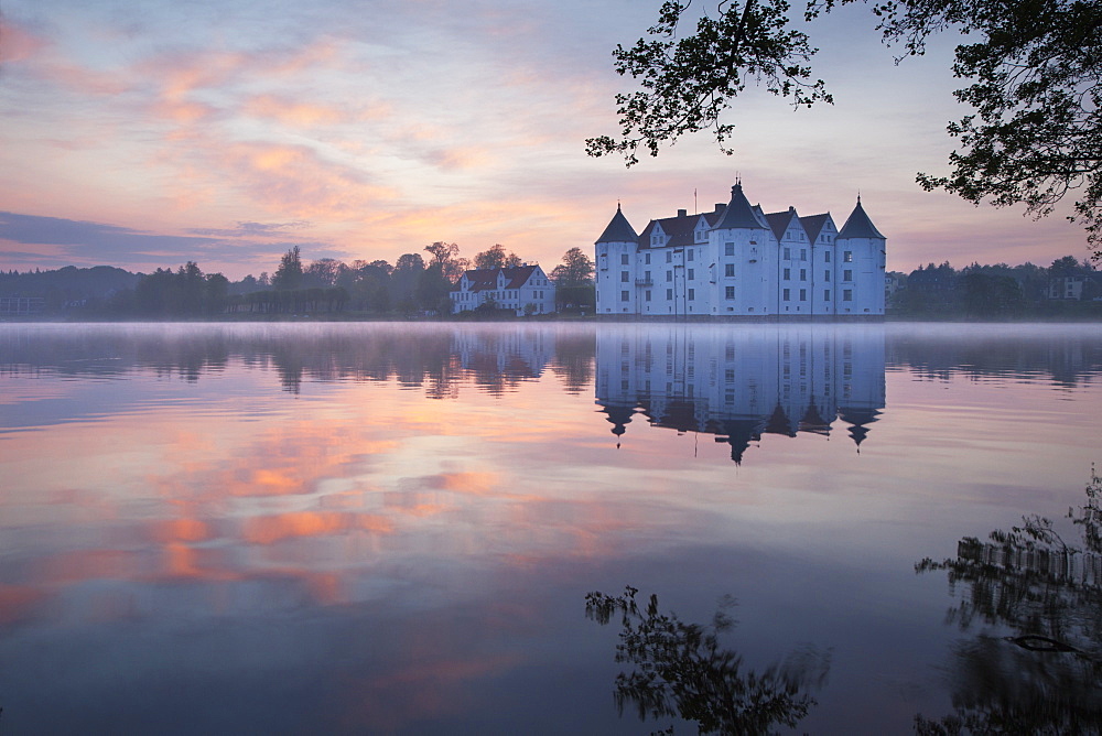 Gluecksburg moated castle at dawn, Flensburg fjord, Baltic Sea, Schleswig-Holstein, Germany, Europe