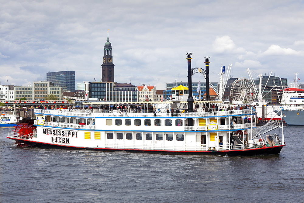 Paddle wheel steamer Mississippi Queen at the harbour in front of St Michaelis church, Hamburg, Germany, Europe