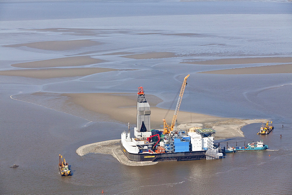 Aerial view of the construction of a wind turbine in the North Sea, Lower Saxony, Germany