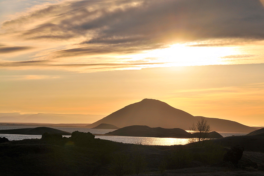 View of backlit lake Myvatn (eastside), North Iceland, Europe