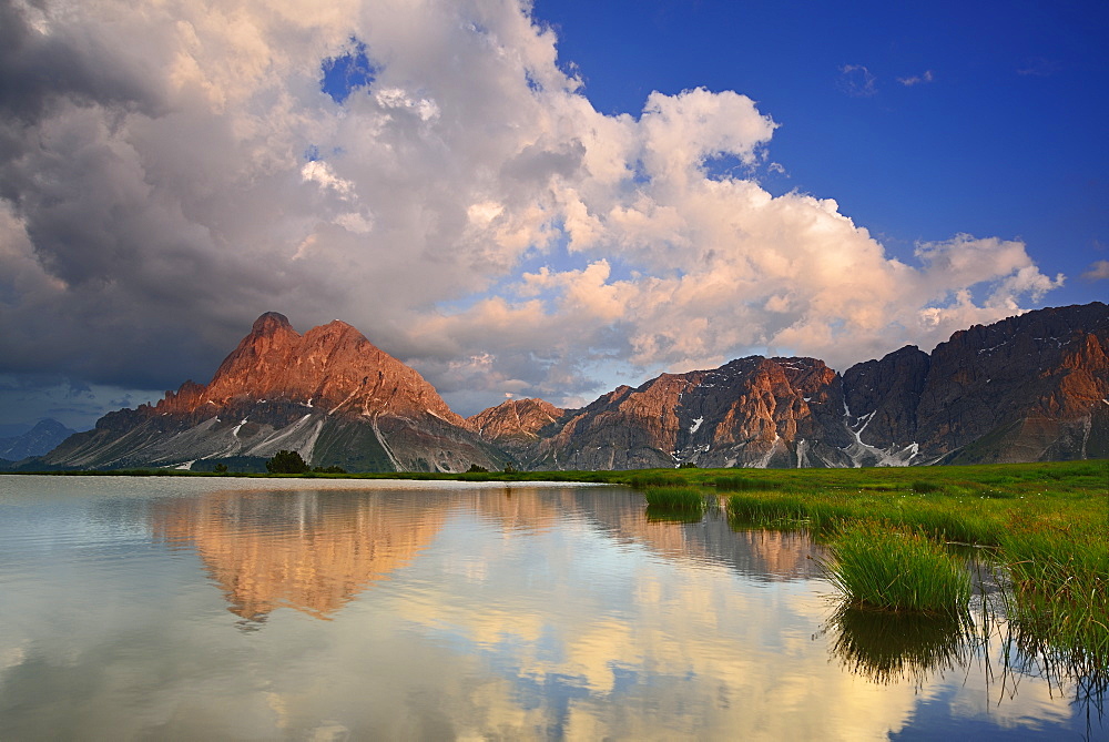 Peitlerkofel reflecting in a mountain lake, Wuerzjoch, Dolomites, UNESCO world heritage site Dolomites, South Tyrol, Italy