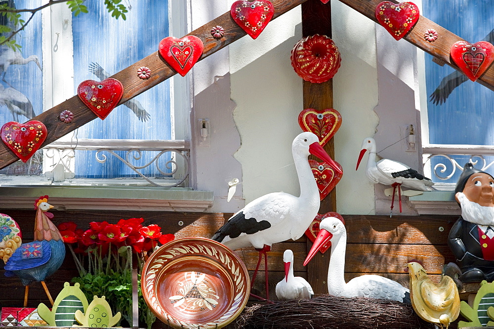 House fassade with decorative storks and ceramics, Petite Venise, Colmar, Alsace, France