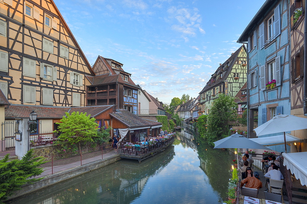 Restaurant and half timbered houses at the Lauch river, Little Venice, Colmar, Alsace, France, Europe