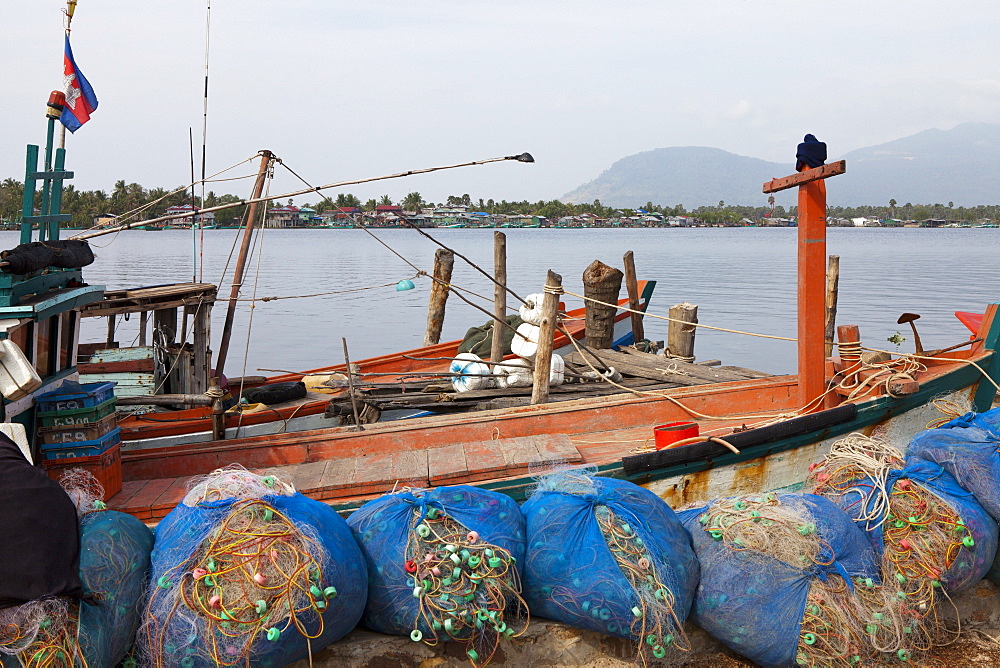 Fishing boats in Kampot at the Prek Thom River, Kampot province, Cambodia, Asia