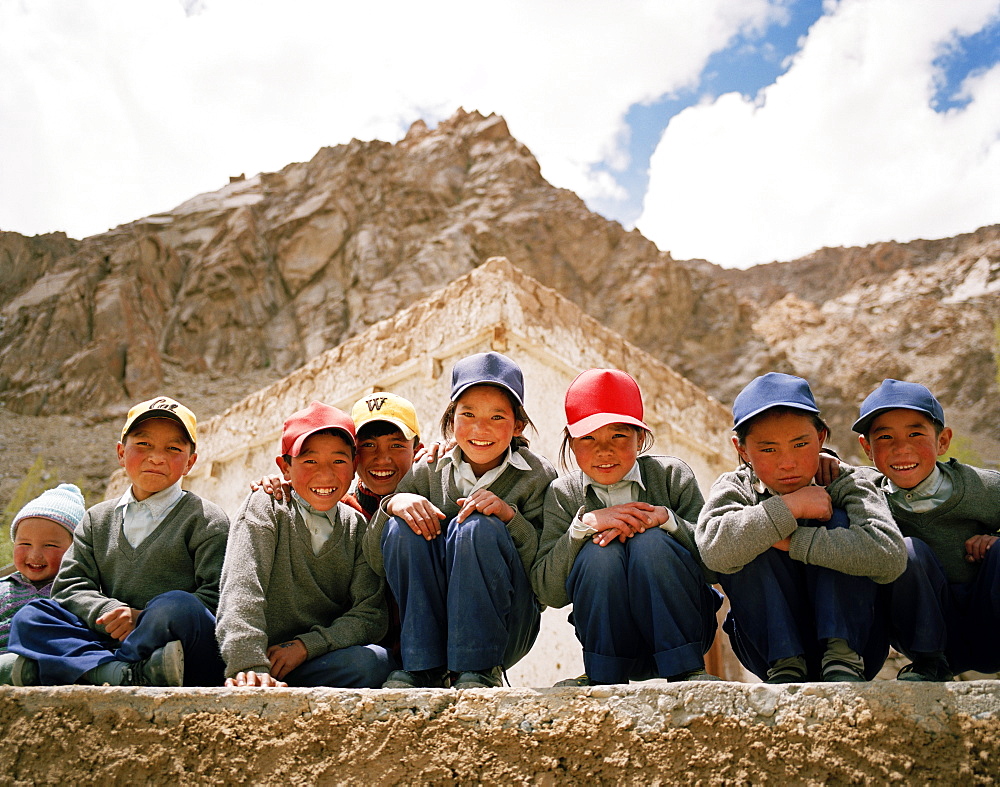 School kids in front of their school, near the convent Thagchokling in village Ney, west of Leh, Ladakh, Jammu and Kashmir, India