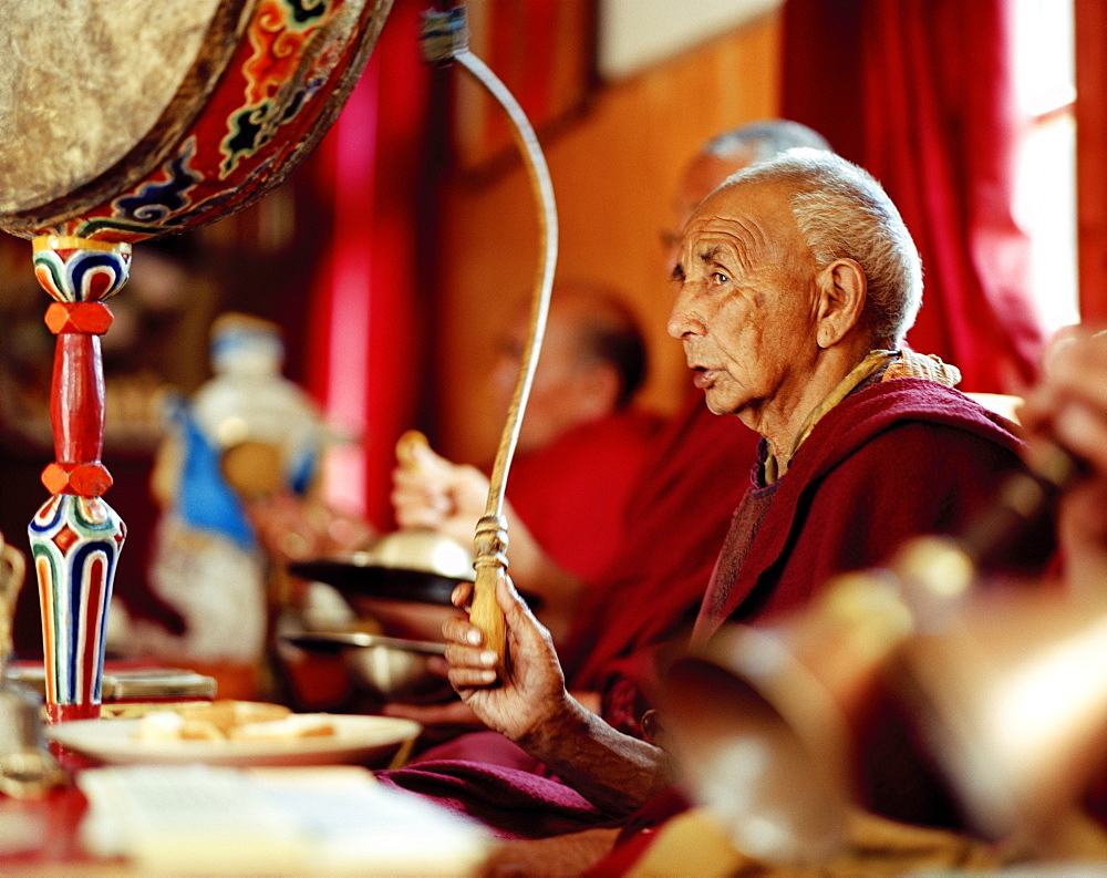 Monks celebrating, praying and playing music at the convent Thagchokling, village Ney, Ladakh, Jammu and Kashmir, India