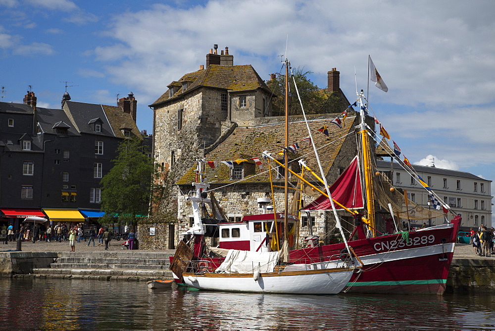 Sailboat and fishing boat in harbor, Honfleur, Calvados, Basse-Normandy, France