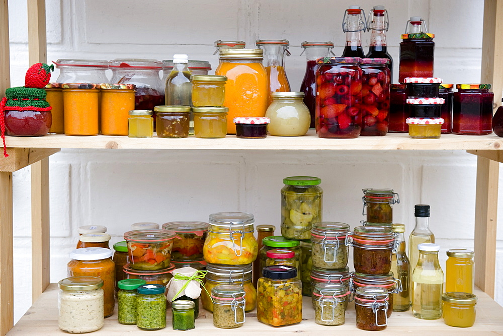 Food larder with shelves of homemade products, Homemade