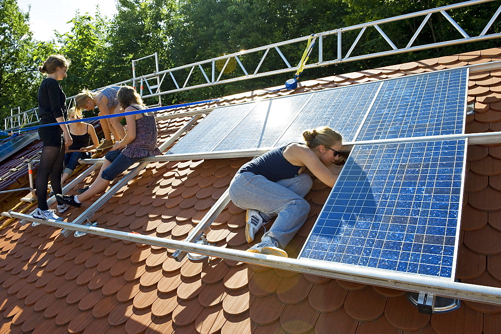 School project, students installing a solar plant, Freiburg im Breisgau, Black Forest, Baden-Wuerttemberg, Germany, Europe