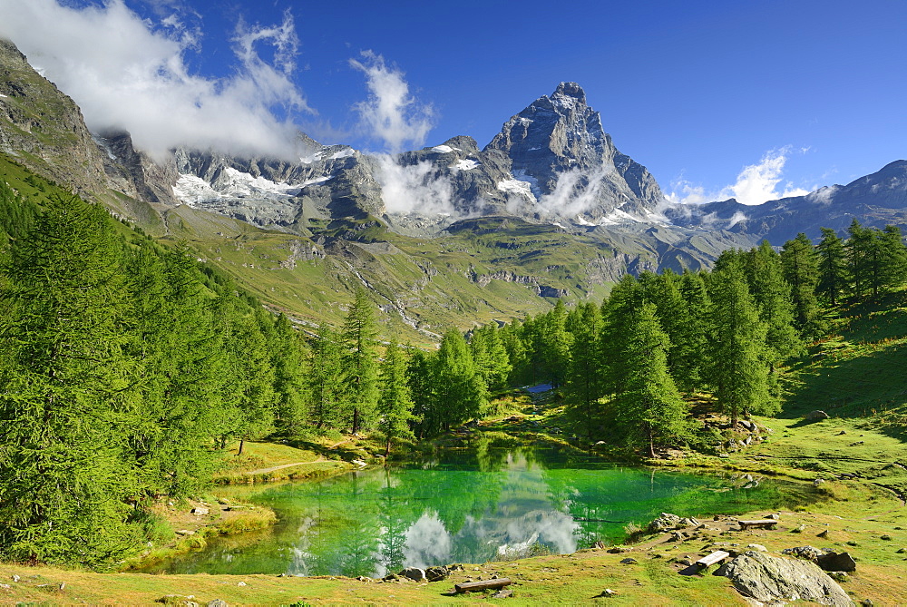 Matterhorn reflecting in a mountain lake, Cervinia, Breuil, Pennine Alps, Aosta valley, Italy