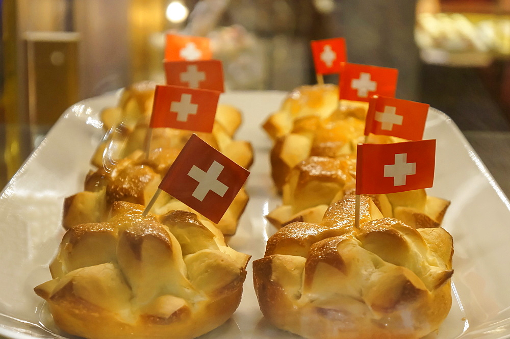 Cake with little swiss flagg, 1 August National day, Zurich, Switzerland