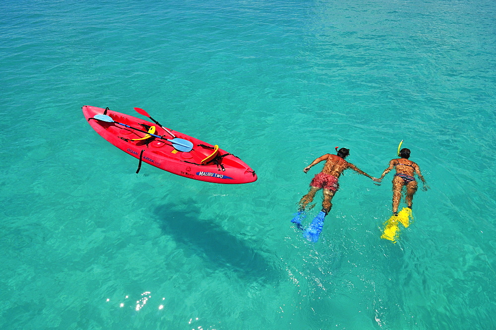 Couple snorkelling, Saint Regis Bora Bora Resort, Bora Bora, Society Islands, French Polynesia, Windward Islands, South Pacific