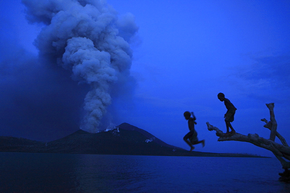 Children on Matupit Island. They have never known their island other then covered in ash, Tavurvur Volcano, Rabaul, East New Britain, Papua New Guinea, Pacific