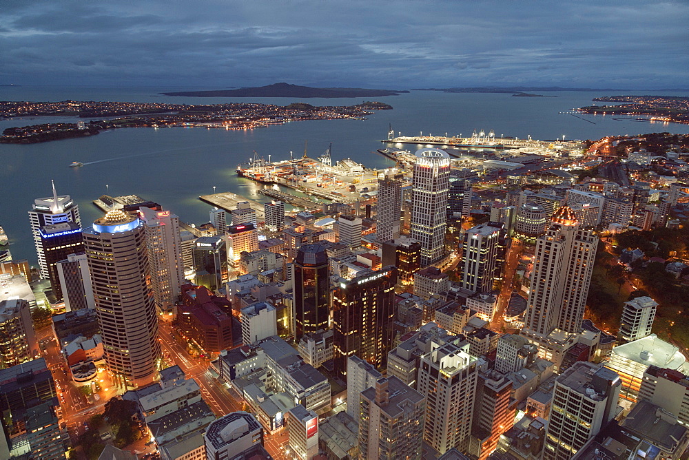 View from Sky Tower over Auckland harbour with highrise buildings in the evening, Auckland City, North Island, New Zealand