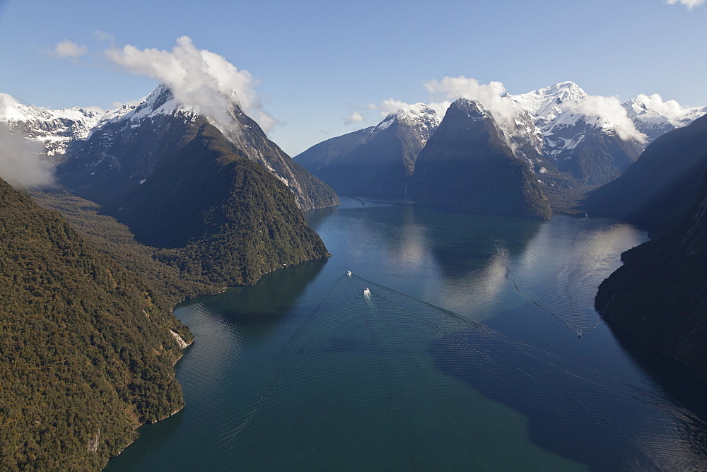 Aerial view of Milford Sound with the snowcapped mountain of Mitre Peak, Milford Sound, Fiordland National Park, South Island, New Zealand