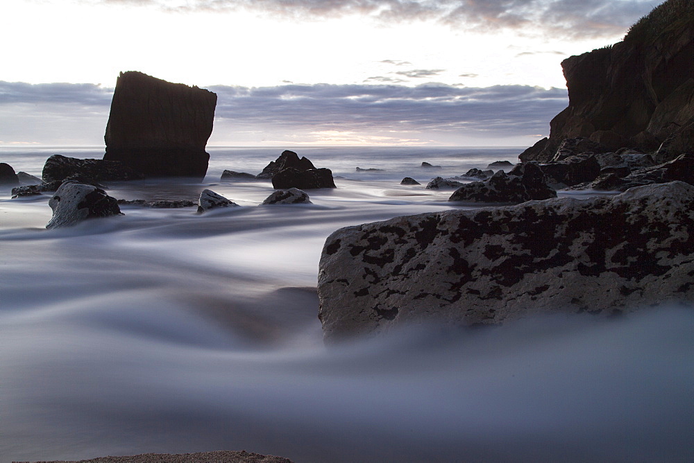 High tide at the river mouth near Karamea, blue hour, Kahurangi National Park, West coast, South Island, New Zealand