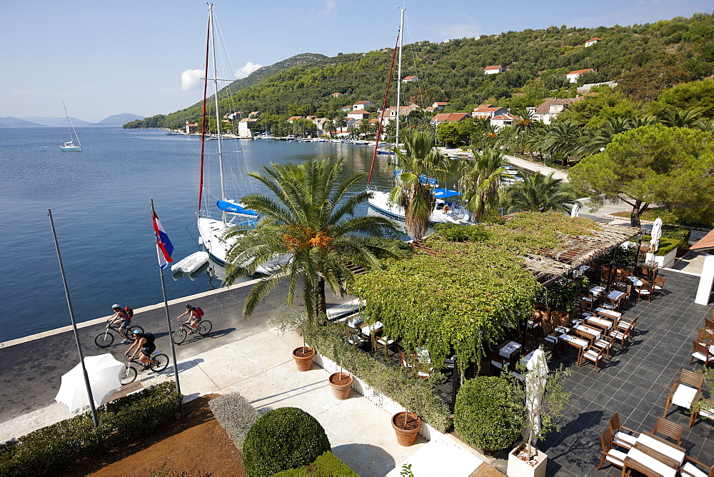 Terrace of hotel restaurant at the natural harbour, Hotel Sipan, Sipanska Luka, Sipan island, Elaphiti Islands, northwest of Dubrovnik, Croatia