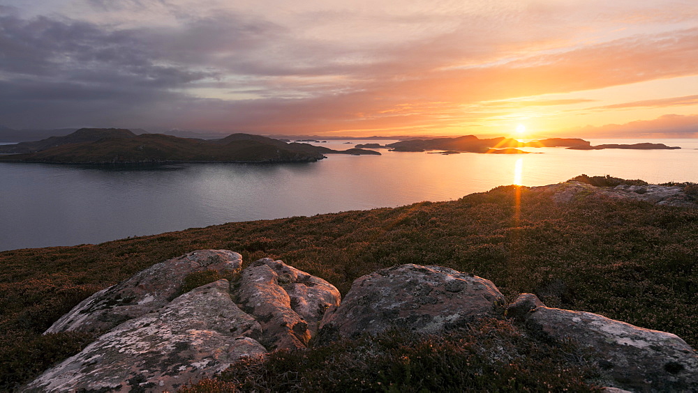 Impressive sunset above the Summer Isles on the coast of the North Highlands, Scotland, United Kingdom
