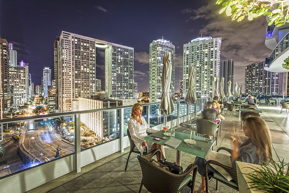 Terrace of gourmet restaurant Area 31 at hotel Epic, Downtown Miami, Miami, Florida, USA