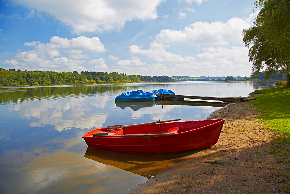 Pond with boats, Dreifelder Weiher, Westerwaelder Seenplatte, Westerwald, Rhineland-Palatinate, Germany, Europe