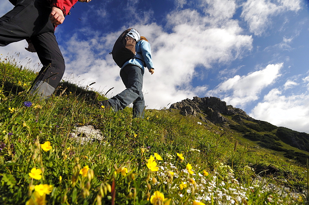 Couple hiking in the mountains, Tannheimer Bergen, Allgaeu Alps, Tirol, Austria, Europe