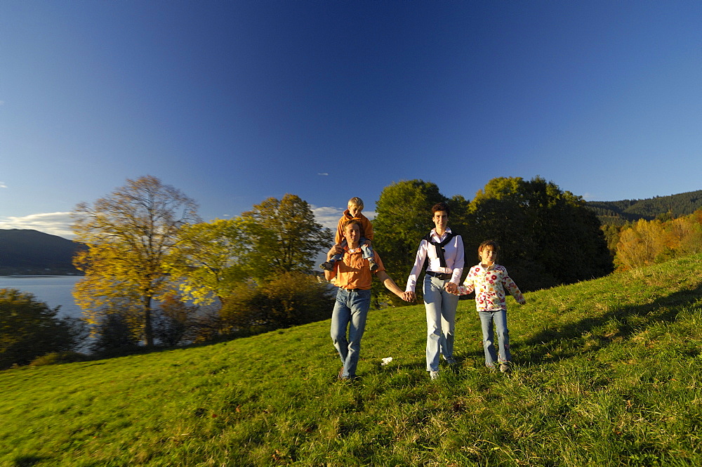 Family hiking near Lake Tegernsee, Bavaria, Germany, Europe