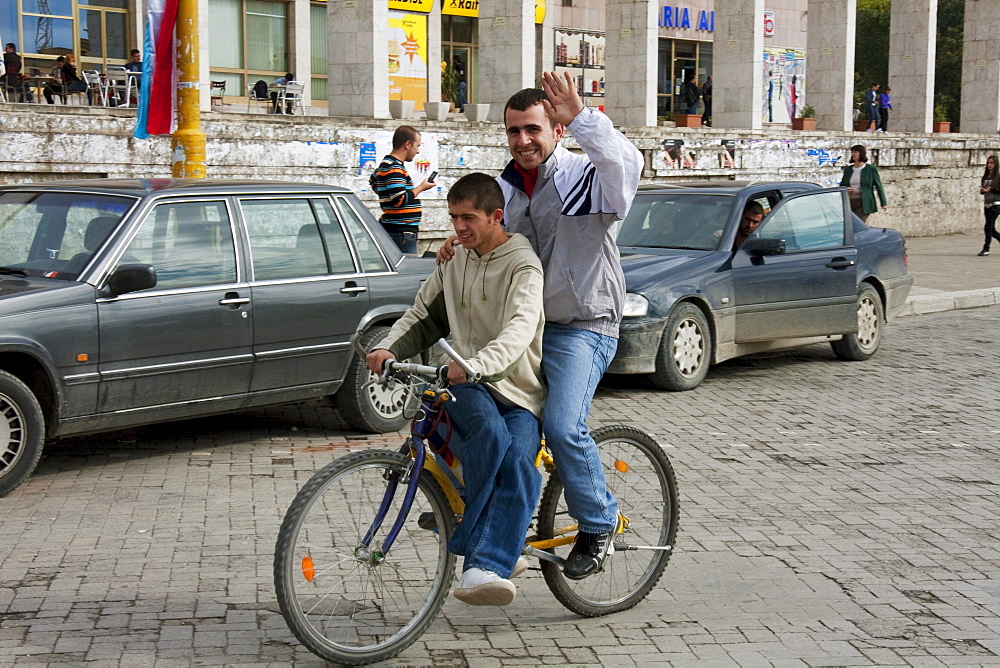 Men on a bicycle, Tirana, Albania