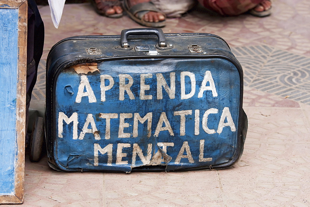 Suitcase of a charlatan, with the inscription - Learn mental mathematics - on it, Cochabamba, Bolivia