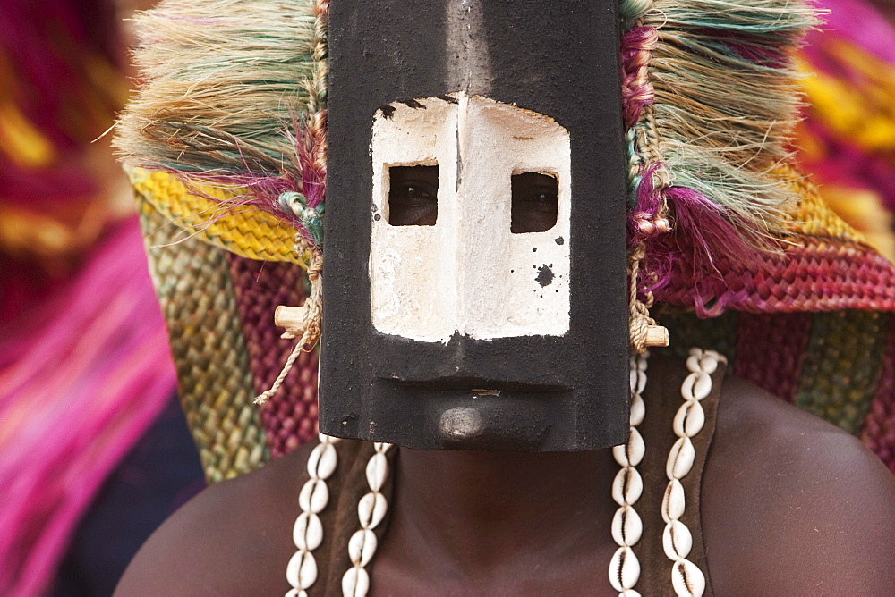 Dancer wearing Kananga mask at the Dama celebration in Tireli, Mali