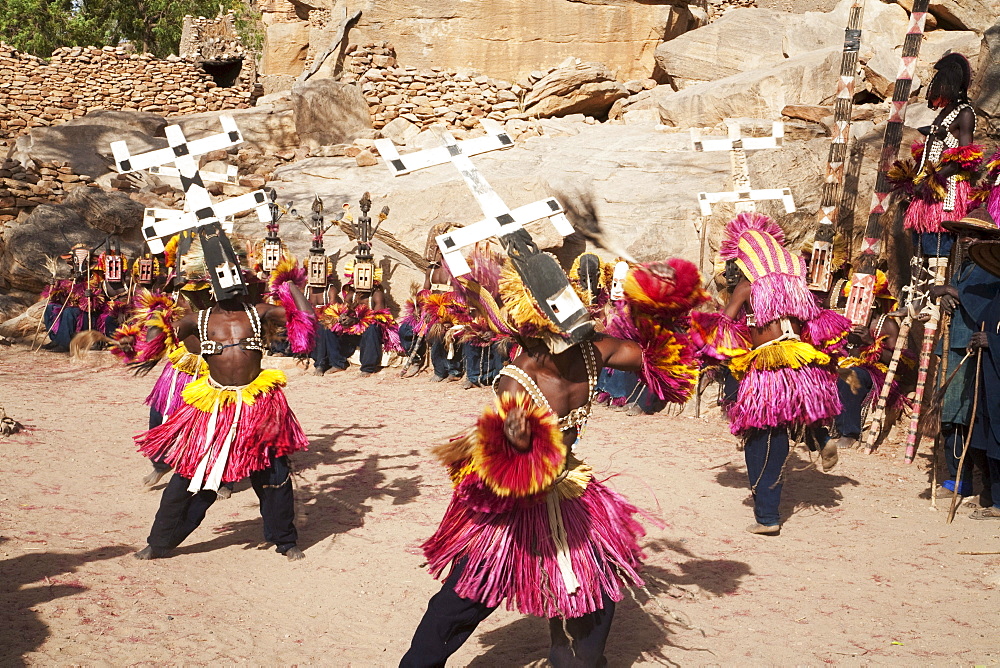 Dancers wearing Kananga masks perform at the Dama celebration in Tireli, Mali