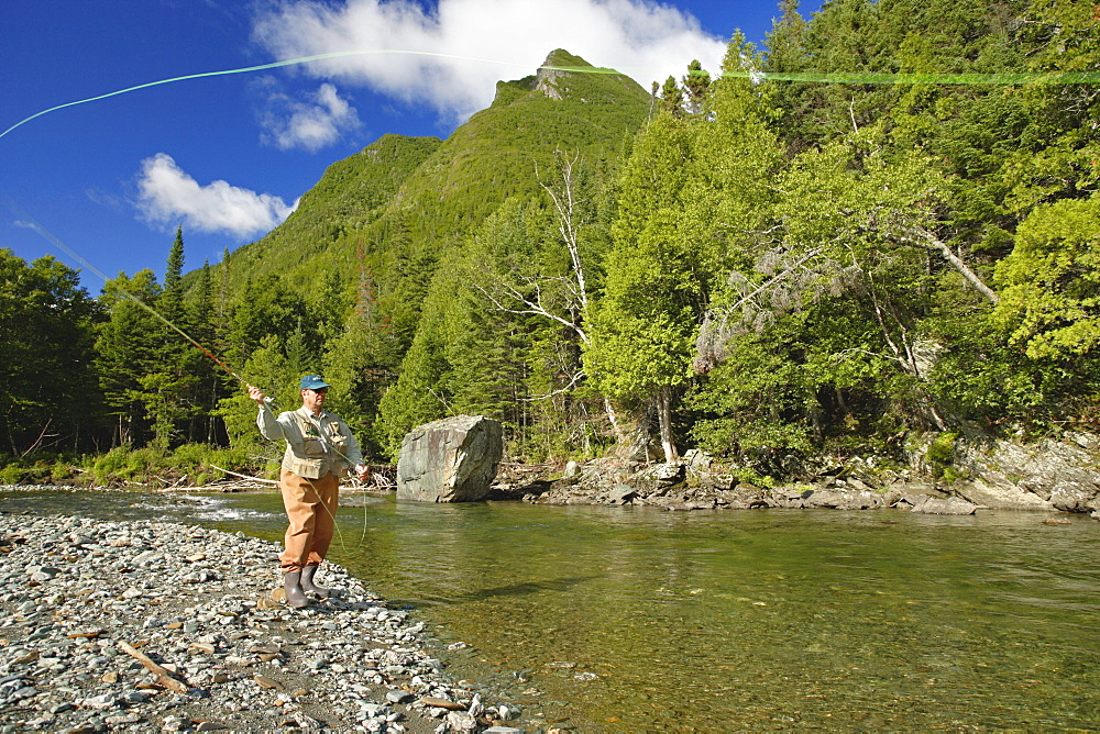 Fisherman on Cap-Chat River, Gaspesie Wildlife Reserve, Quebec