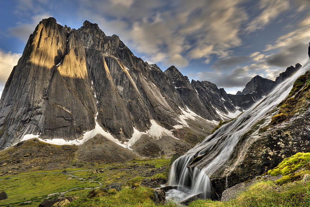 Flowing glacial creek with Mount Harrison Smith in background, Cirque of Unclimbables, Nahanni National Park, Northwest Territories