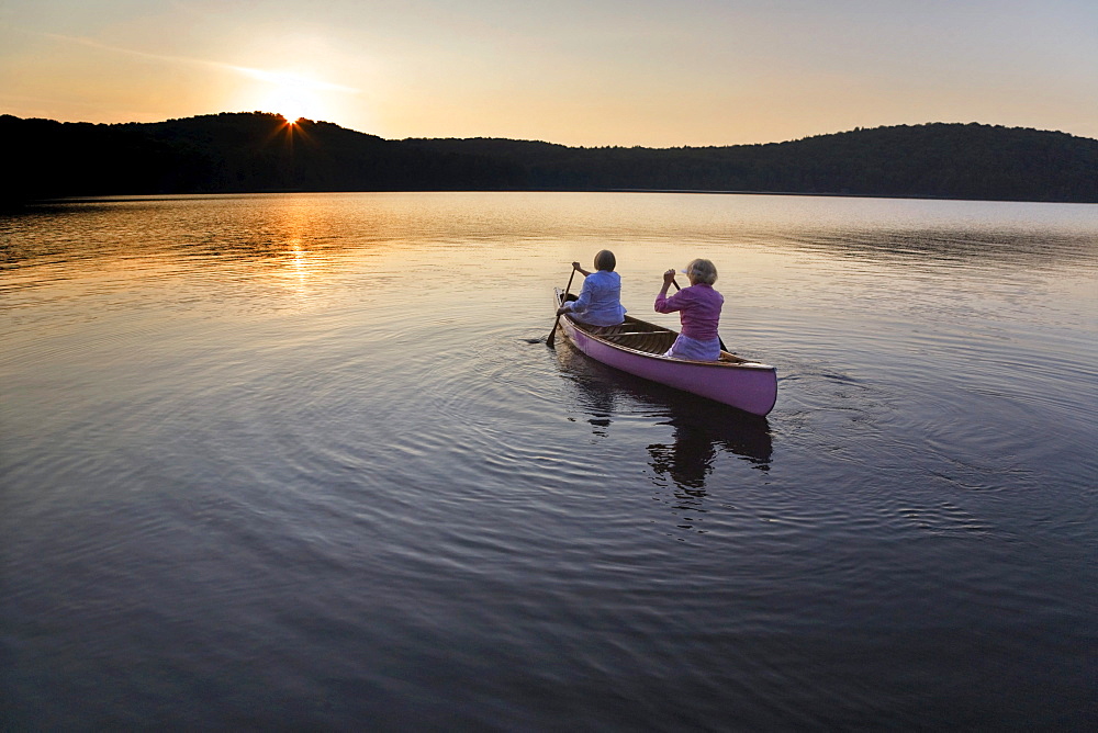 Paddling toward the sunset, Smoke Lake, Algonquin Park, Ontario