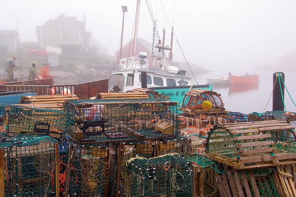 Lobster traps and fishermen, Peggy's Cove, Nova Scotia