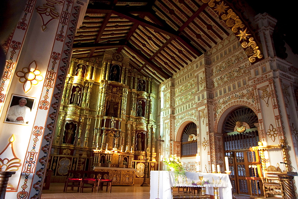 Main altar with gilded and polychrome wood images carved in the Mestizo-Baroque style, Jesuit Mission of San Ignacio de Velasco, Santa Cruz Department, Bolivia