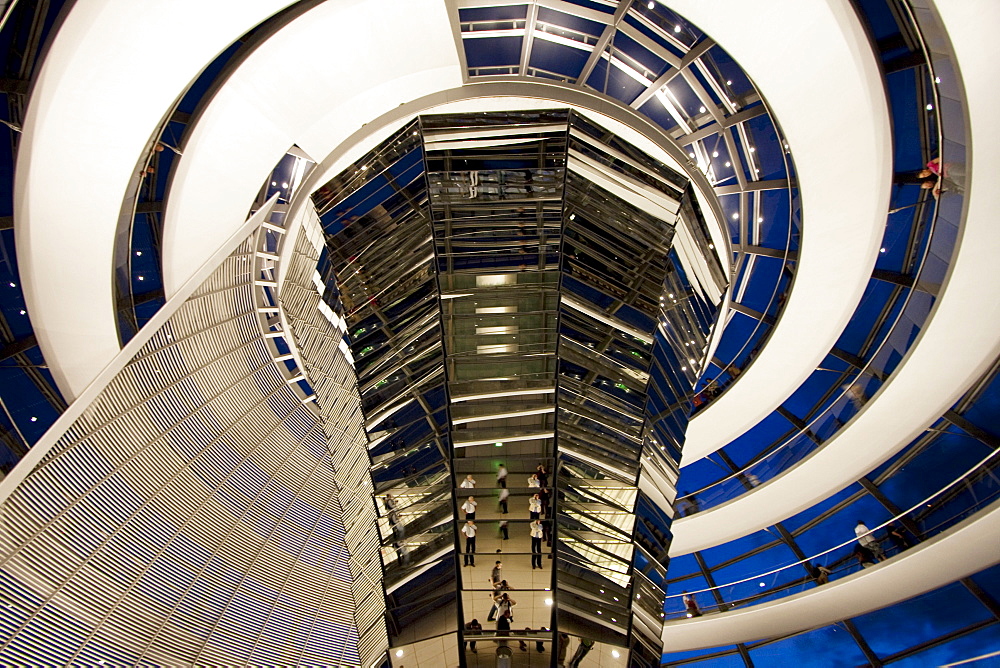 Inside Norman Foster's Dome of the Reichstag Building at night, Berlin, Germany