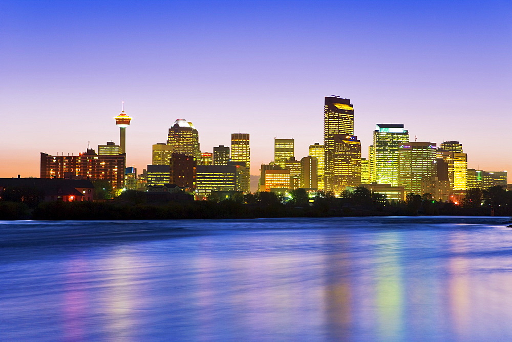 Skyline and Bow River at dusk, Calgary, Alberta