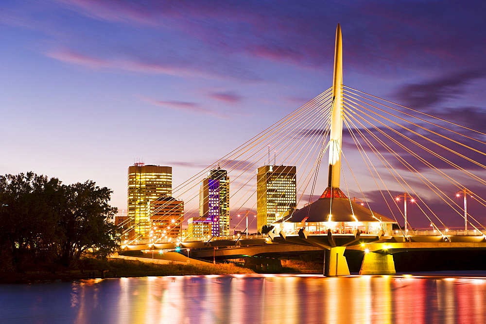 City skyline, Red River and Provencher Bridge at dusk, Winnipeg, Manitoba