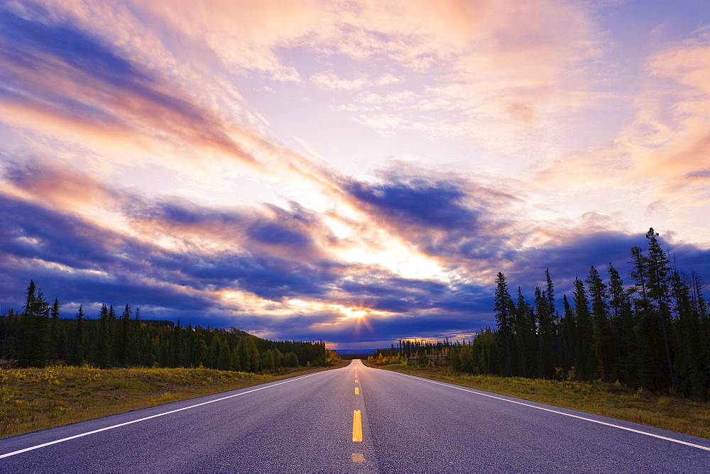 Big Horn Highway 40 and sky at sunrise, Alberta