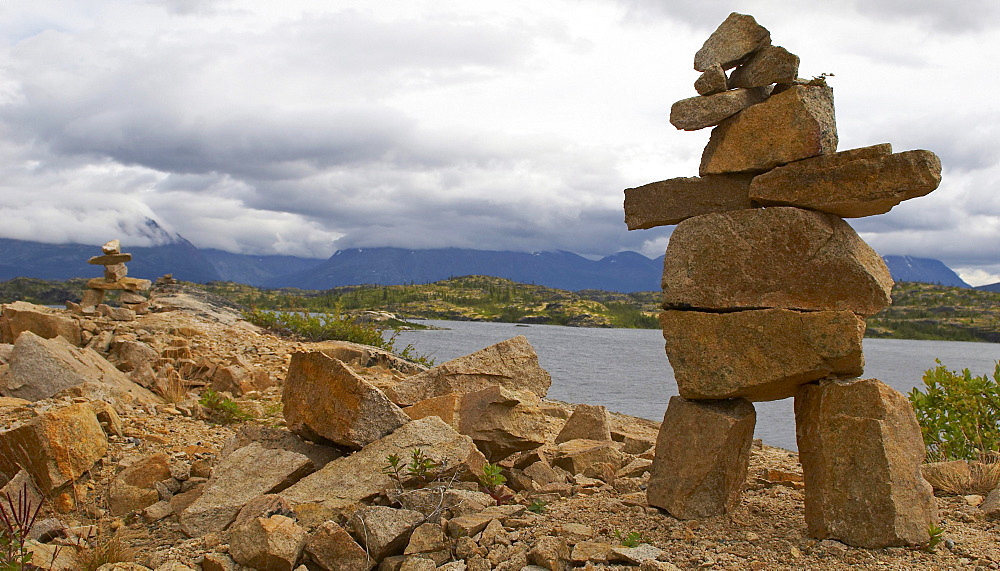 Two inukshuks on the Canadian side of the Canadian-American border located at White Pass, between Carcross, Yukon, and Skagway, Alaska.