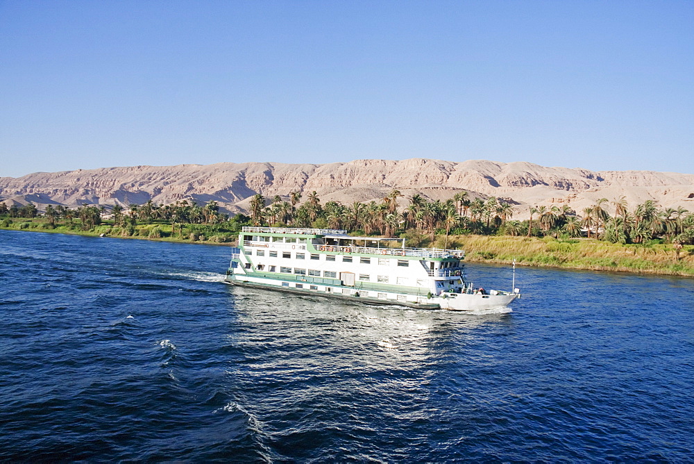 River cruise boat on the Nile River between Isna and Luxor, Qina, Egypt