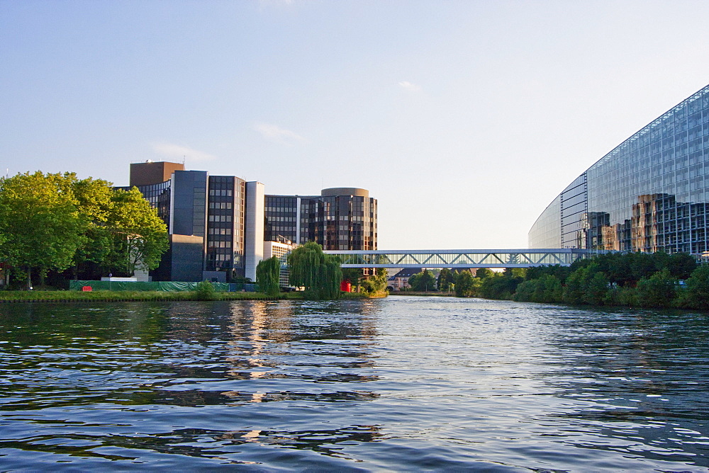 Winston Churchill building and the European Parliament on the banks of the Ill River, Strasbourg, France