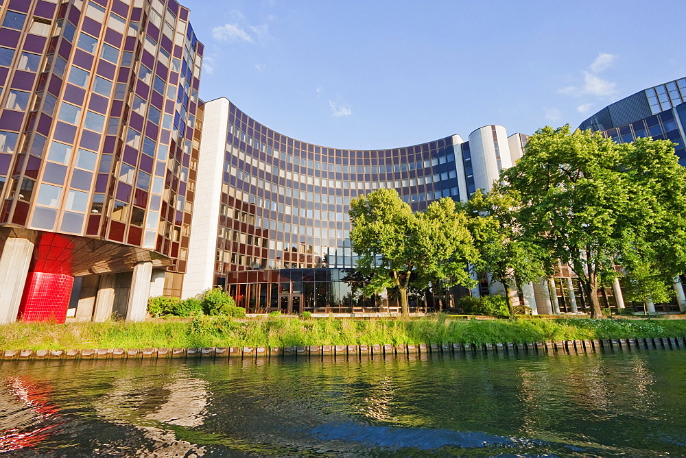 The Winston Churchill building of the European Parliament on the banks of the Ill River, Strasbourg, France