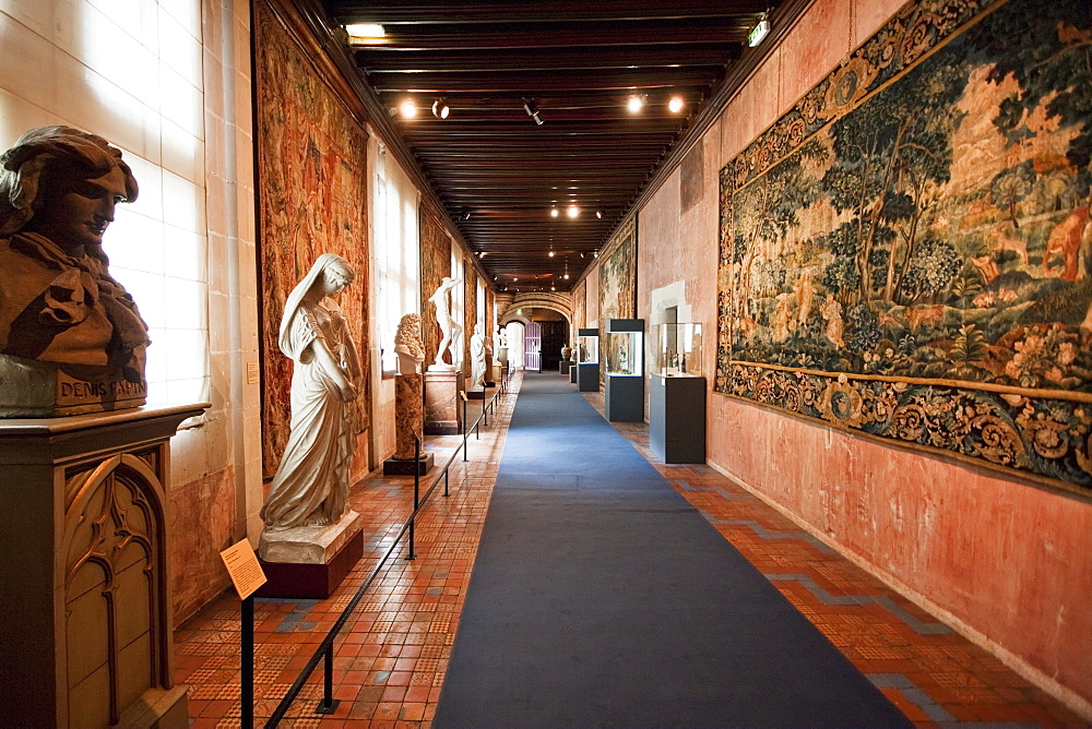 Tapestries and sculptures on display in the Louis XIII wing of the Chuteau de Blois, Blois, France