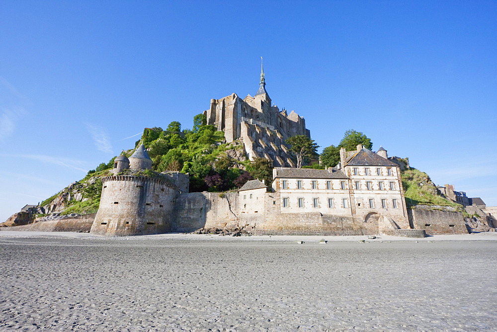 Mont-Saint-Michel and mudflats in the bay, as seen from the Southwest, France