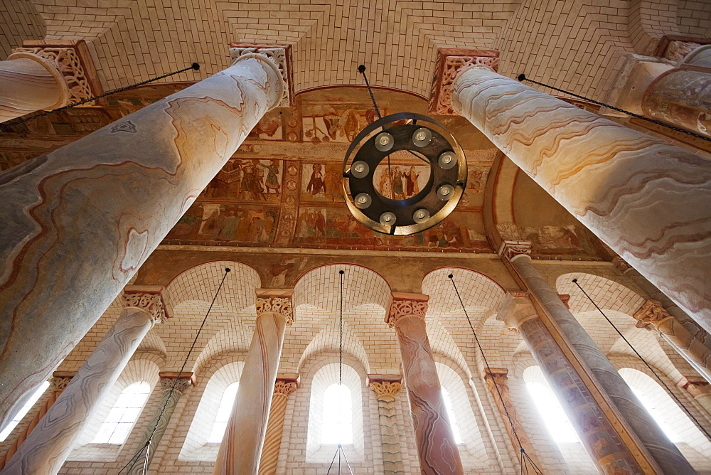 Romanesque murals on the ceiling and painted columns in the central nave of the Abbey Church of Saint-Savin sur Gartempe, Saint-Savin sur Gartempe, Vienne, France