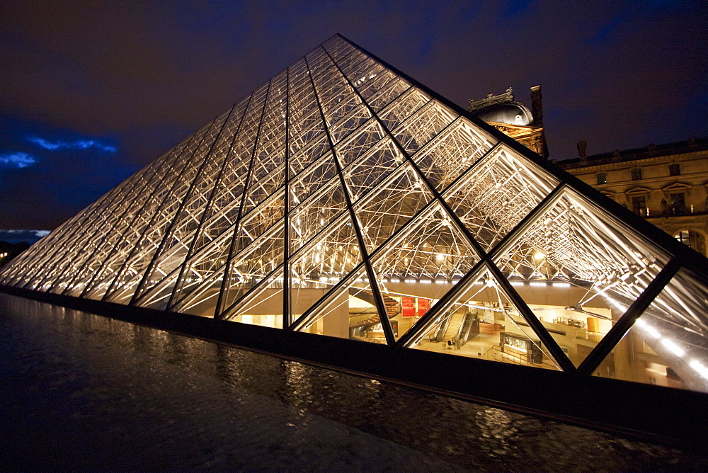 Louvre Pyramid by the architect I.M. Pei at night, Paris, France